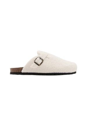 White woolen slip-on clog featuring a rectangular buckle, cork footbed, and textured surface with a black rubber outsole.