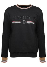 Felpa nera con maniche lunghe, collo a costine e dettagli a righe a contrasto nel colletto e nei polsini; presenta testo in rilievo e logo.