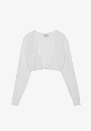Cardigan blanc court avec un décolleté en V profond, fabriqué en tissu tricoté texturé. Il présente des manches longues et une accentuation en bouton doré au niveau de la fermeture.