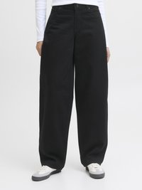 Black wide-leg denim pants with a high waist, featuring a button closure, belt loops, and side pockets. Worn with white and gray sneakers.