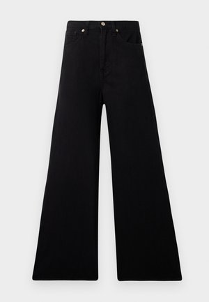 Svarta vida jeans i denim, med hög midja, fyra fickor och metallknappslutning. Slen yta och strukturerad form.