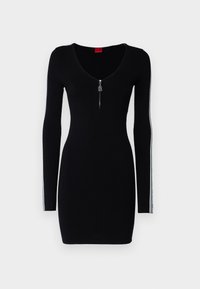 Schwarzes langärmliges Kleid mit tiefem V-Ausschnitt, featuring einem frontalen Reißverschluss und gestreiften Akzenten entlang der Ärmel, aus Strickmaterial gefertigt.