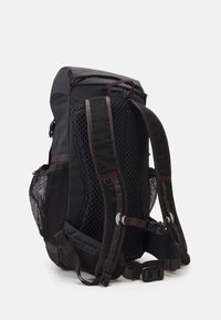 Black backpack with a structured design, featuring mesh back panel, padded straps, and multiple pockets. Includes adjustable hardware details.
