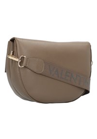 Brown leather crossbody bag featuring a curved design, gold hardware, and a fabric strap with "Valentino" embossed in gray.