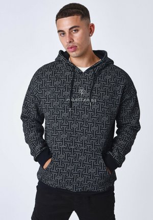 Un sweatshirt à capuche noir avec un motif géométrique, des cordons de serrage et une poche avant. Fabriqué en tissu doux avec des poignets et un ourlet côtelés.