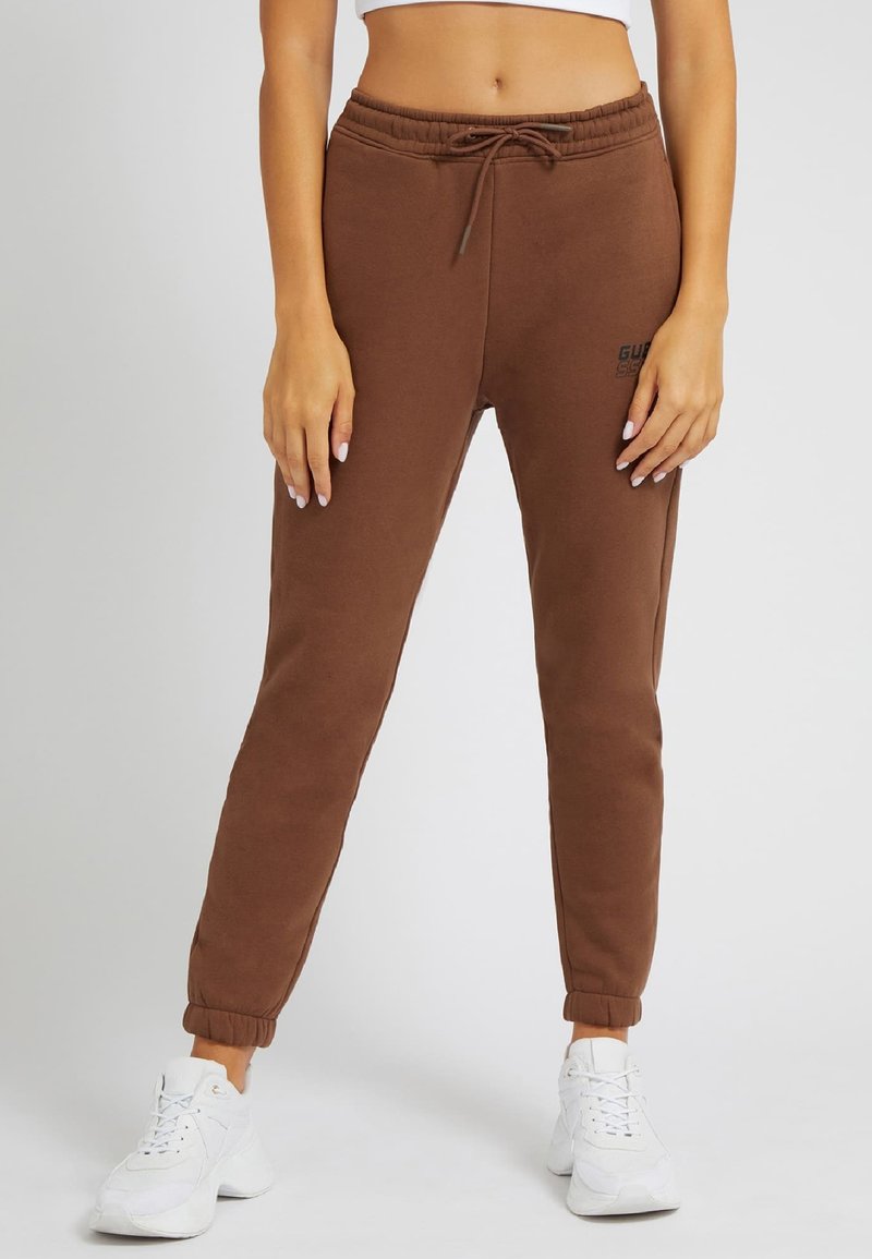 Guess ALISHA LONG Tracksuit bottoms braun/brown Zalando.de