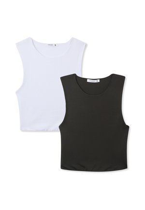 Dwa bezrękawnikowe topy w kolorze białym i czarnym, wykonane z gładkiego, elastycznego materiału, z okrągłym dekoltem i minimalistycznym wzornictwem.