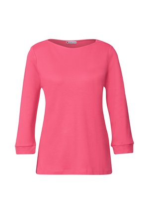 Top de mujer de manga larga rosa brillante con cuello redondo y puños ajustados, exhibido sobre un fondo blanco.