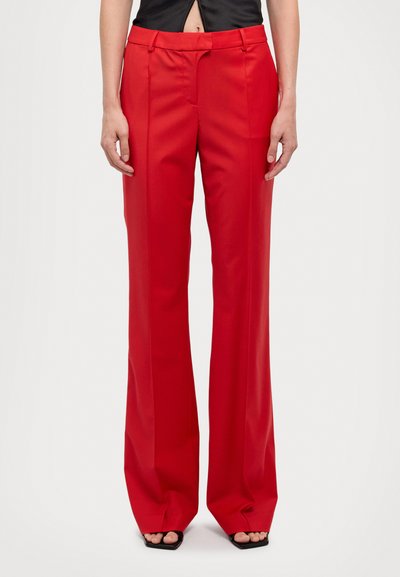 Red, wide-leg trousers made of smooth fabric with a high waist, featuring front pleats and a clean, tailored design.