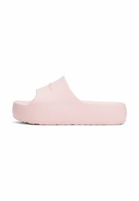 Infradito rosa chiaro realizzati in materiale morbido e flessibile. Caratterizzati da una punta aperta e una suola piatta spessa per comfort e stabilità.