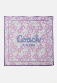 Floral-patterned silk scarf in shades of lavender and mint green, featuring "Coach New York" logo in blue, bordered with a solid purple trim.