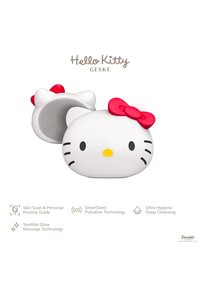 Hello Kitty Gesichtsreinigungsgerät, weiß mit rosa Schleife, runde Form, strukturierten Rücken für einen guten Halt, enthält verschiedene Hautpflegetechnologien.