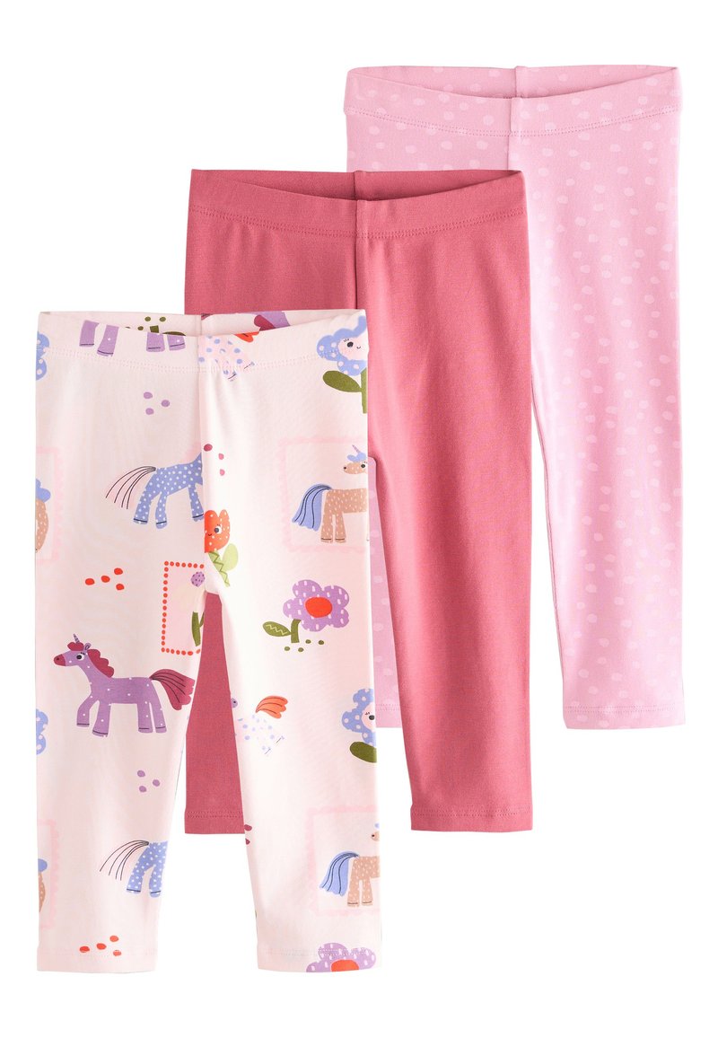 Drei Paar Leggings: ein Paar mit Einhorn- und Blumenmuster, ein einfarbiges pinkes Paar und ein hellrosa Paar mit Polka-Dots. Alle haben einen elastischen Bund und bestehen aus Baumwollmischung.