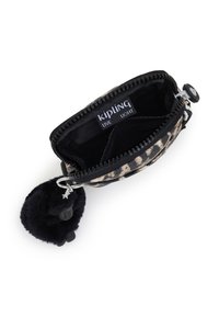 Kipling zippered wallet in leopard print fabric, black lining, and furry black pom-pom keychain. Interior features one compartment and logo label.
