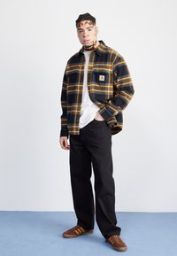 Carhartt WIP LANDON PANT - Jeans relaxed fit - black