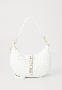 White quilted handbag with a curved shape, featuring gold hardware and a prominent "Valentino" logo. Includes a removable shoulder strap.