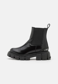 Botines con plataforma - nero