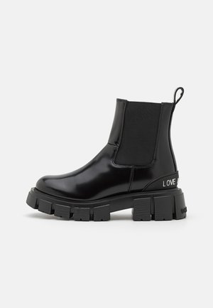 Stivaletti con plateau - nero