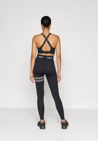 Stronger HERO LEGGINGS - Tajice - black