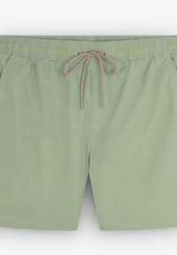 Shorts de bain vert clair avec une ceinture élastique et un cordon de serrage beige. Comprend un tissu lisse et des poches latérales.