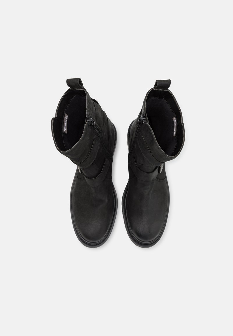 Schwarze Knöchelstiefel aus Leder, mit elegantem Design, glatter Textur, seitlichen Reißverschlüssen und Schlaufen für einfaches Anziehen.