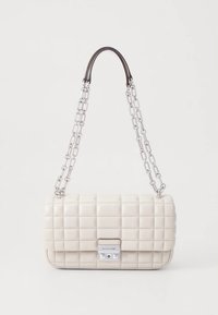 Quilted beige handbag with a chain strap, featuring a silver clasp and square patterns on the surface. Smooth texture, rectangular shape.