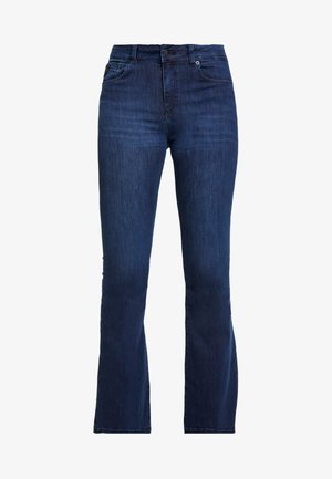 Tumedast sinisest denimist laienevad teksad kõrge vöökohaga, viie tasku, vöölõngade ja nupu sulgemisega. Sujuv tekstuur koos tuhmumise detailidega.