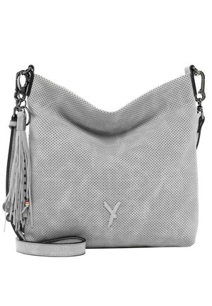 Light gray perforated leather shoulder bag with detachable strap, metal clasps, and a tassel keychain on the left side.