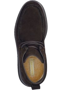 Bruin suède schoen met een afgeronde neus, vetersluiting en fleece voering. Beschikt over een trekband en het GANT-logo op de binnenzool. Rubberen zool.