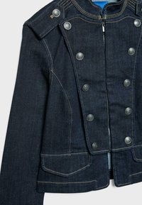 Dark blue denim jacket with front zipper, double row of metal buttons, flap pockets, and contrasting yellow stitching.