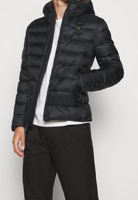 Blauer Dunjakker - black