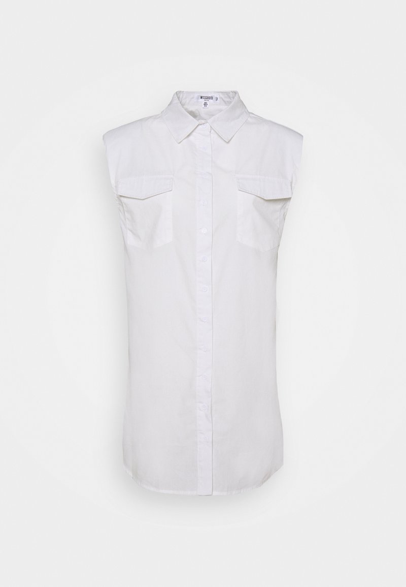Sleeveless white button-up shirt with two front flap pockets and a pointed collar.
