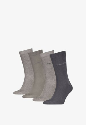 Quattro paia di calzini Calvin Klein a metà polpaccio in diverse tonalità di grigio, disposti affiancati, con un logo sottile vicino al bordo superiore.