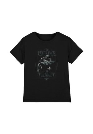 Black t-shirt featuring Batman with cape spread, text above and below stating "I am Vengeance, I am The Night."