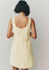 Next SLEEVELES - Blusenkleid - buttermilk yellow