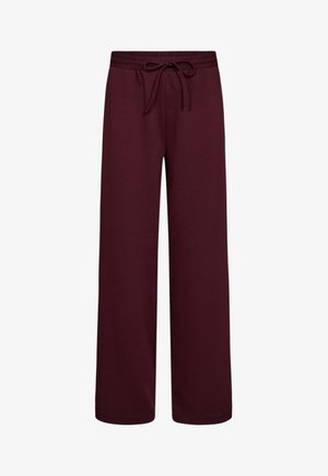 Bordeaux wijde broek van zachte stof, met een elastische tailleband met trekkoord. Glad textuur en geen zichtbare patronen of accenten.