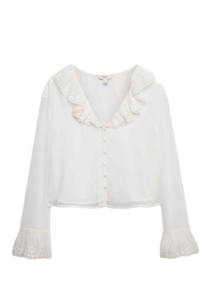 Witte, cropped blouse met een kraag van kant, lange mouwen met kantaccenten op de manchetten en een knoopsluiting aan de voorkant.