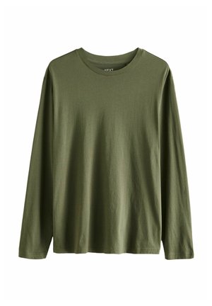 T-shirt z długim rękawem w oliwkowym kolorze, wykonany z gładkiej bawełny. Posiada okrągły dekolt i prosty dół z bocznymi rozcięciami.