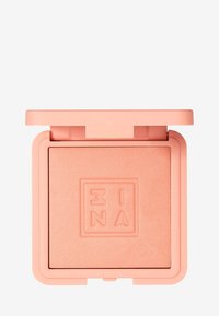 Peach blush kompakt med matt finish, med preget logo, glatt tekstur og en myk rosa beholder.