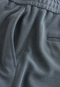 Next MOTIONFLEX  REGULAR FIT - Housut - mid blue