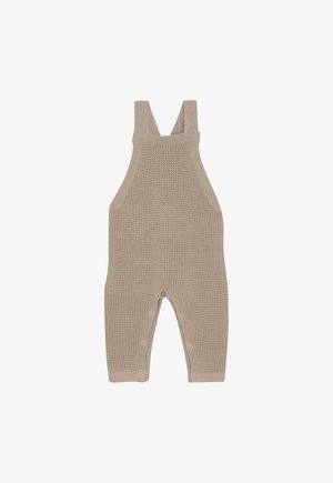 Beige knitted baby romper with adjustable shoulder straps and snap buttons along the inseam for easy diaper changes.