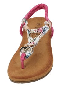 Sandalini rosa con fascia intrecciata, dettagli floreali, finiture dorate e un motivo a forma di cuore. Sottopiede morbido simile alla pelle scamosciata; design open-toe.