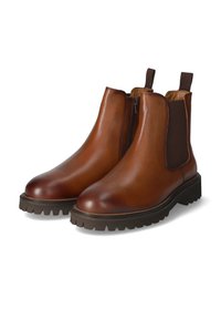Bruna läder Chelsea boots med elastiska sidopaneler, rund tå och texturerad gummisole med djup mönstring för grepp.