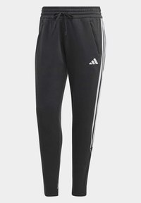 Zwarte sportieve broek van zacht materiaal met een elastische tailleband, verstelbaar trekkoord en witte zijstrepen. Met logo op het linkerbeen.