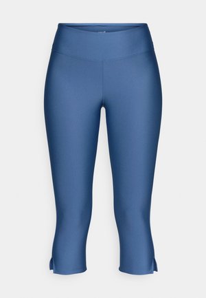 Blue capri leggings made from smooth, stretchy fabric. Features a high waistband and small side slits at the hem for added comfort.