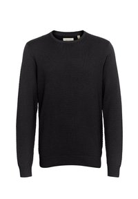 Maglione nero textured con collo rotondo, polsini e orlo a costine. Presenta un motivo intrecciato in tutta la sua lunghezza, realizzato in un tessuto morbido.