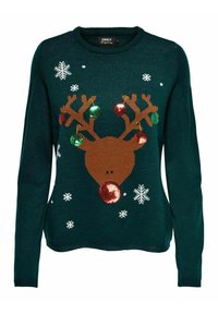 Maglione verde lavorato a maglia con un design di renna marrone, decorato con accenti di paillettes e motivi di fiocchi di neve. Collo rotondo e maniche lunghe.