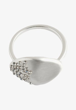 Silver ring with a smooth oval face, decorated with clustered small clear crystals on one side.