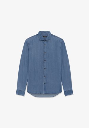 Denim-särgi keskmise sinise tooniga. Esiosas nööbitav, terava kraega ja pikkade varrukatega, millel on nööbitavad mansetid. Sile tekstuur.