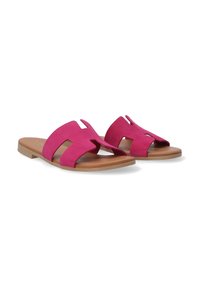 Roze suède sandalen met een open teen, voorzien van een uitsnijdontwerp en een platte bruine zool. De banden zijn breed en comfortabel gevormd.